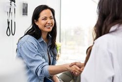 a man and a woman looking at the camera