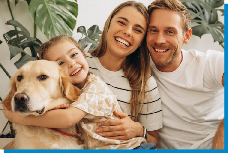 a person and a dog posing for the camera